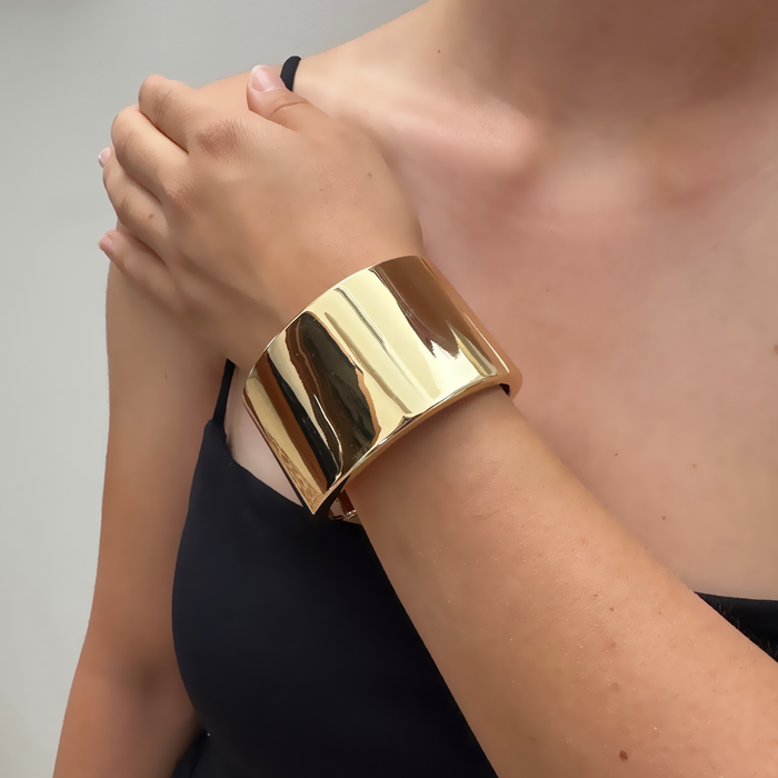 Bracciale fascia in bronzo dorato