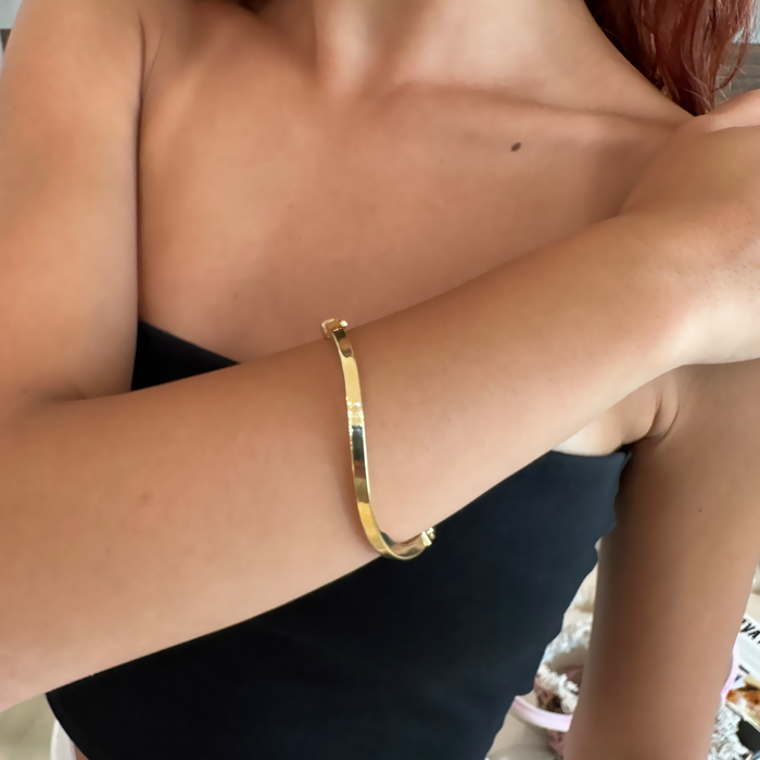 Bracciale rigido onda in argento 925 dorato
