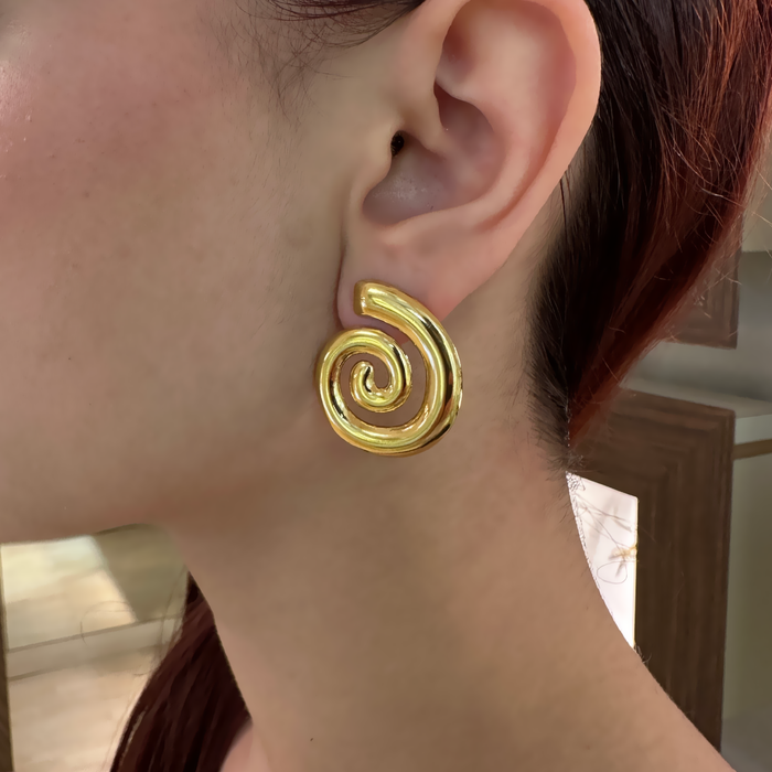 Orecchini in bronzo dorato spirale