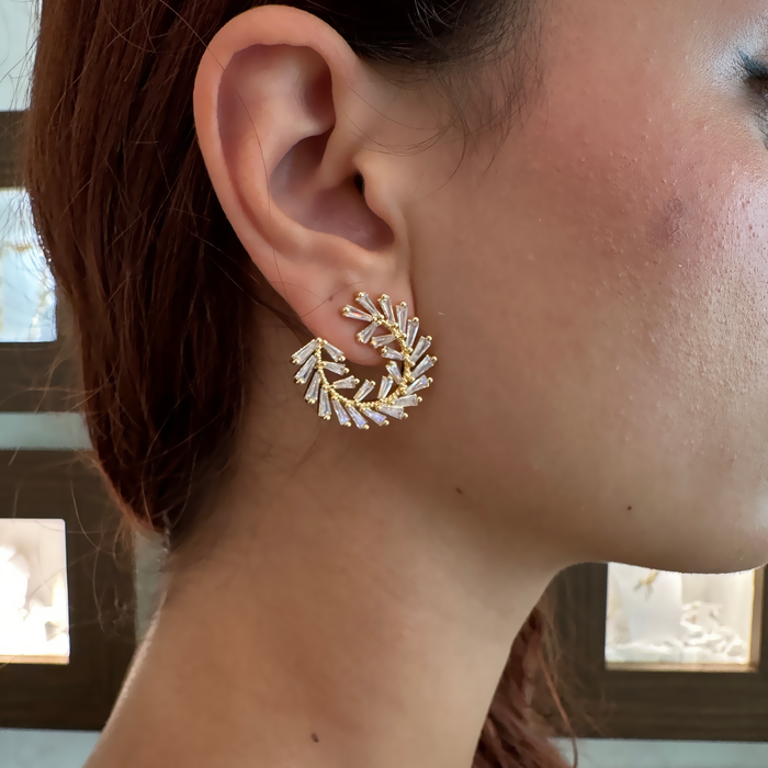 Orecchini in bronzo dorato con zirconi